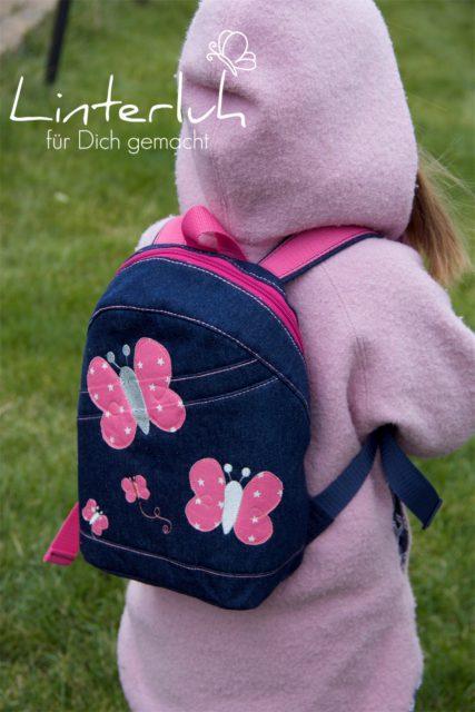 ROANI Hansedelli Kinderrucksack nähen für Kinder Schnittmuster Rucksack jeans pink Schmetterlinge